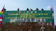 Banner Terpasang Upacara Pembukaan TMMD Siap Digelar, Kami Senang